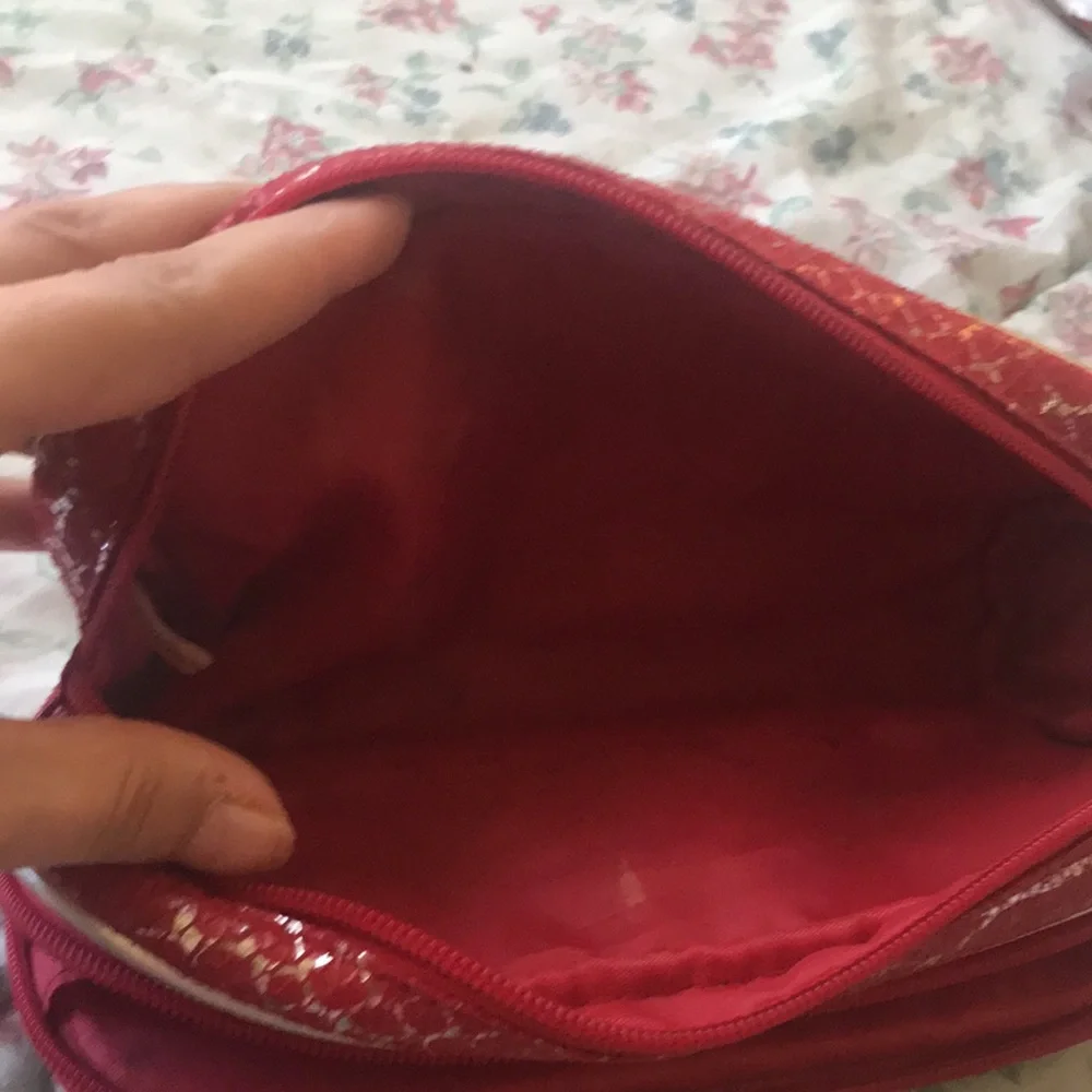 ELLE Bold and stylish Red cosmetic bag featuring Silver Snakeskin pattern.